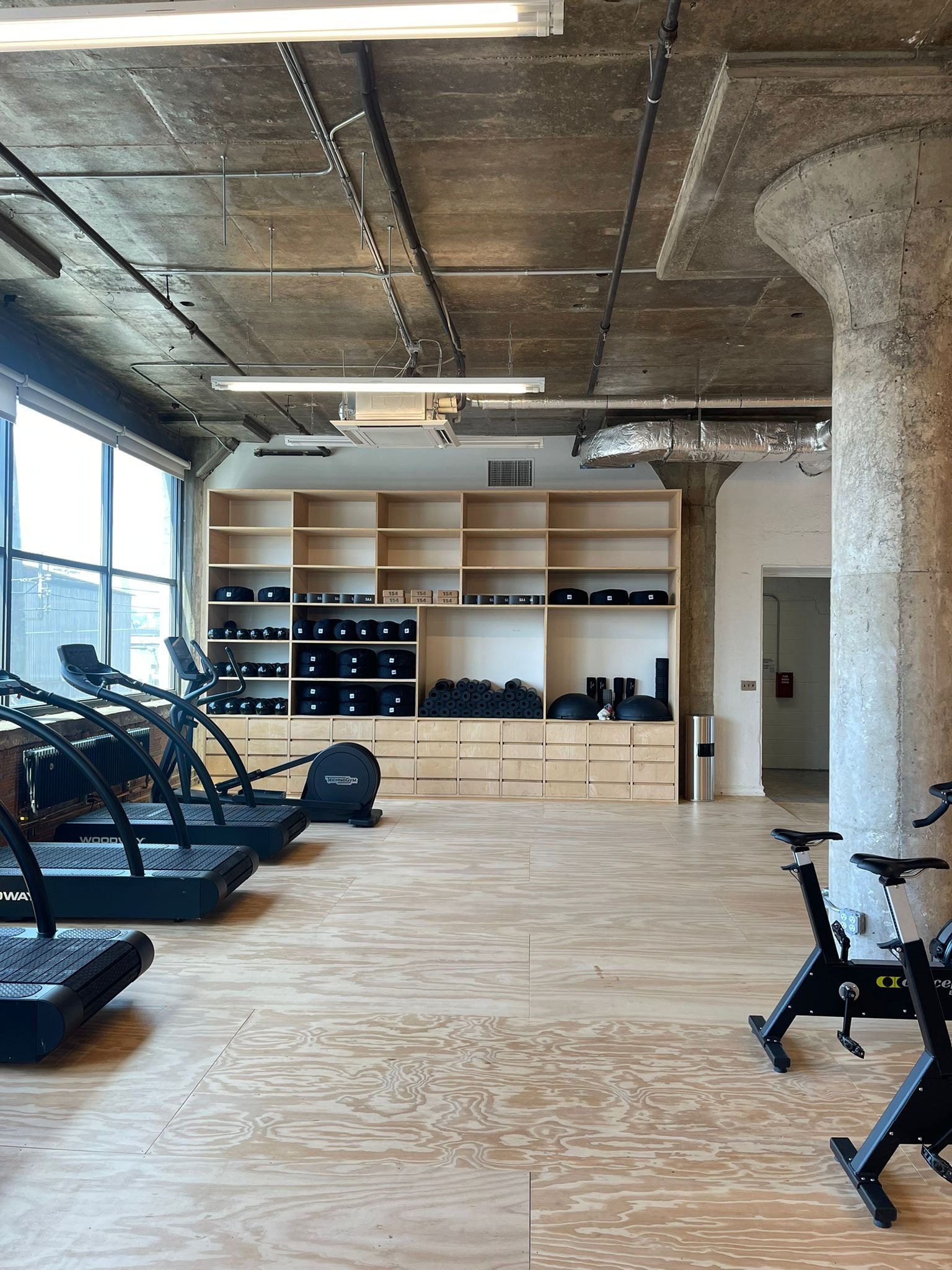 The SAA equipment wall beside the treadmills