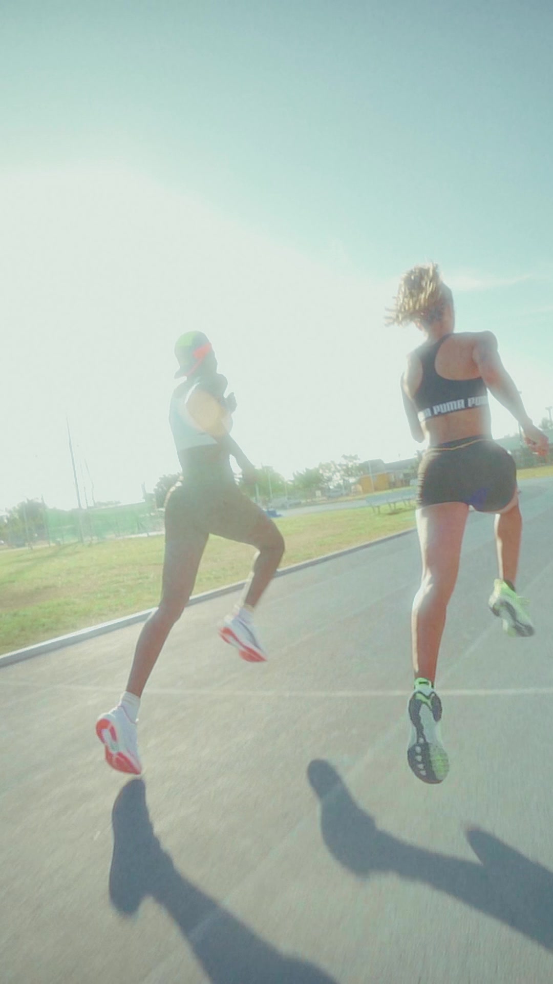 Sprinters on the back straight at Cayman National Stadium. Sam Su